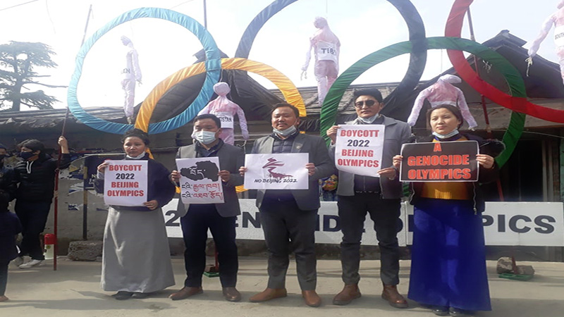 Tibetan activists holding Boycott 2022 Beijing Olympic and Genocide Olympic placards on February 3, 2021 in Mcleod Ganj, Dharamshala. Photo:TPI/ Namgyal Dolma