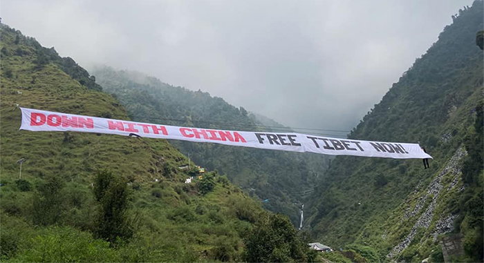 "Down with China, Free Tibet Now" to protest of China's illegal occupation of Tibet. Photo: file