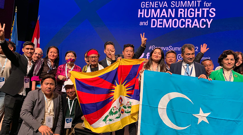 Tibetan activist Tenzin Tsundue and other activists at the Geneva Summit for Human rights and Democracy on April 6, 2022. Photo: file