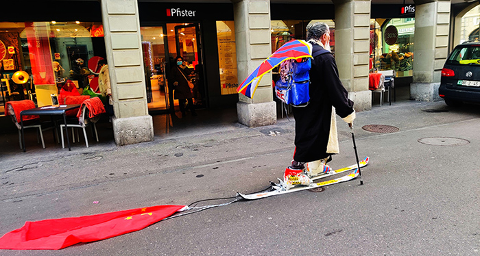 Tibetan activist Loten Namling walks in ski boots in Bern, Switzerland, 26 January 2022. Photo: file 