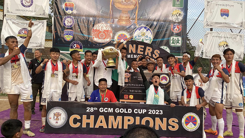 Dhasa United celebrates winning the 28th Gyalyum Chenmo Memorial (GCM) Gold Cup, June 11, 2023. Photo: TPI