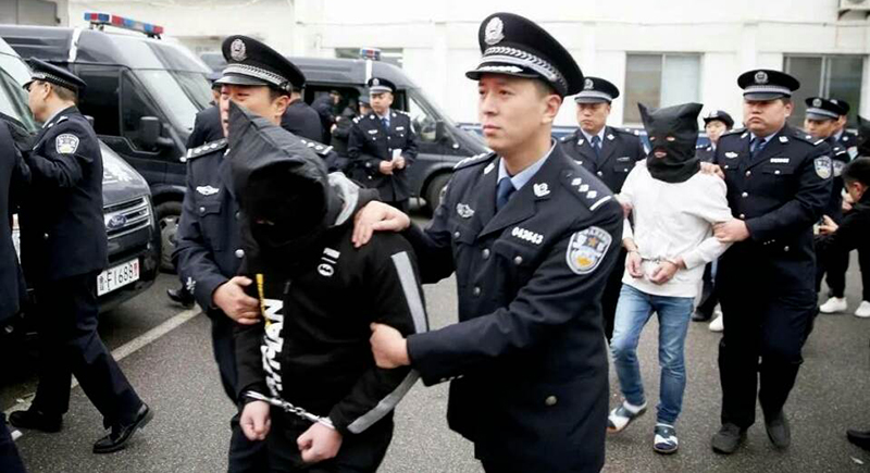 Chinese authorities arrest people in China. Photo: file