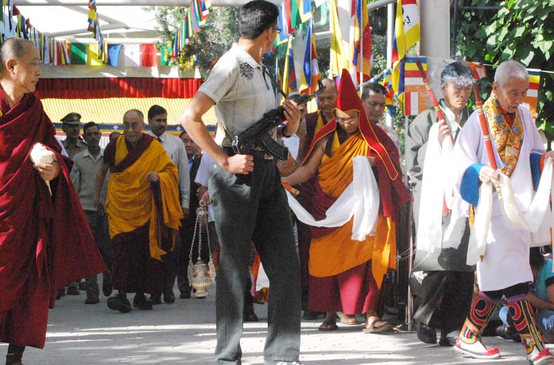 His Holiness the Dalai Lama walking to the main Tibetan temple in Dharamshala to attend a long-life prayer offering Jonangpa and Dharamshala Tibetans on 27 April 2010. Photo: TPI