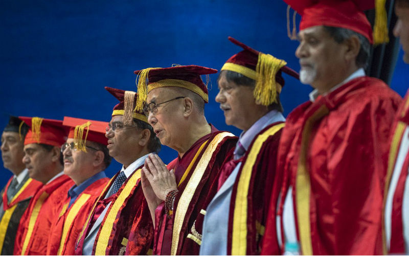 Participants on the dias standing during the Indian National Anthem as of the Lal Bahadur Shastri Institute of Management Convocation comes to an end in Delhi, India on April 23, 2018. Photo by Tenzin Choejor