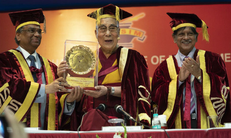 Members of the faculty taking a group photo with His Holiness the Dalai Lama at the conclusion of the Lal Bahadur Shastri Institute of Management Convocation in Delhi, India on April 23, 2018. Photo by Tenzin Choejor