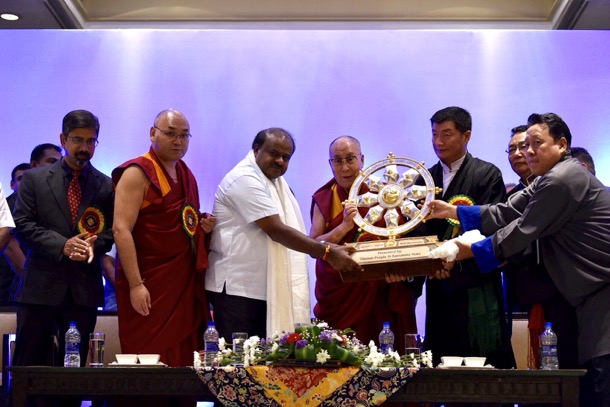 His Holiness the Dalai Lama, President Dr Lobsang Sangay and Speaker Khenpo Sonam Tenphel presenting the Dharma Chakra to CM HD Kumaraswamy at Taj Hotel, Bengaluru, India, on August 10, 2018. Photo/Tenzin Phende/DIIR