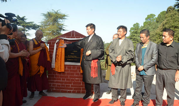 President Dr Lobsang Sangay lays the foundation stone of a new auditorium for the Tibetan Institute of Performing Arts, in Dharamshala, India on September 18, 2018. Photo: TPI/Yangchen Dolma