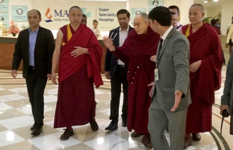 His Holiness the Dalai Lama making his way out from the Max hospital after successfully recovering from a chest infection. Photo: OHHDL