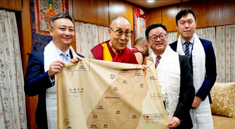 His Holiness the Dalai Lama holds the map of Taiwan with the delegation from Taiwan, at his residence in Dharamshala, India, on July 25, 2019. Photo: VOT